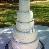 5 tier ivory wedding cake