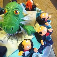 SHOWSTOPPER CAKE    dinosaur cake for a choral singer