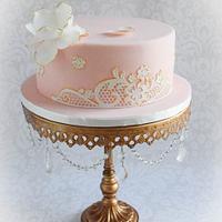 Gilded lace and flower cake