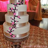 4 tier Faux cherry blossom wedding cake. 