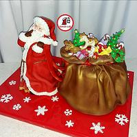 Santa Claus and his toy bag cake