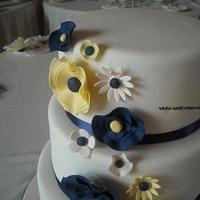 Abstract Flowered Navy & Yellow Wedding Cake