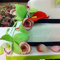 Roses, calla lilies and orchids wedding cake