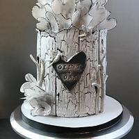 Olive + Oak cake with wafer paper hearts and crackle effect