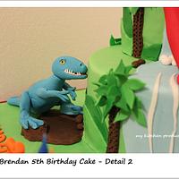 Dinosaurs and volcano cake