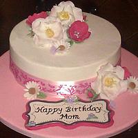 Simple butter cream cake with fondant flowers