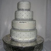 Simple White and lace Wedding Cake