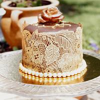 Decadent gold and chocolate mini cake