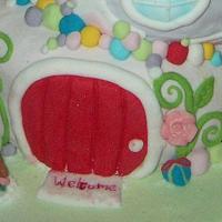Topsy turvy fairy house cake