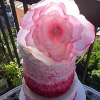Ruffle pink cake with rice paper flowers