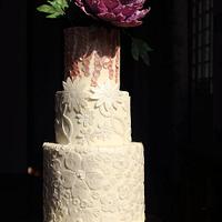 LACE APPLIQUE AND FLORAL WEDDING CAKE