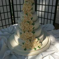 Cascading chocolate roses wedding cake
