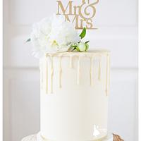 Buttercream double barrel wedding cake with drips