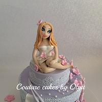 BD cake with a girl figurine