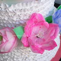 Floral cake with waper paper flower arrangement