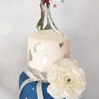 White, navy and Silver wedding cake