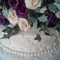 Roses, Sea Holly and lace wedding cake