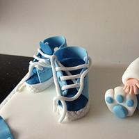 christening cake with trainers and rabbit