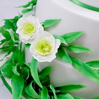 wedding cake with eucalyptus leaves