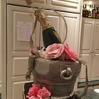 Champagne bottle bucket cake with picture frame family tribute 