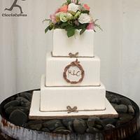 Rustic Romantic Wedding Cake with vertical line detailing and edible twig monogram