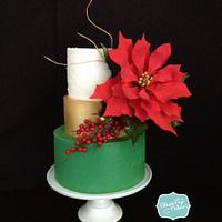 Christmas cake with a sugar poinsettia