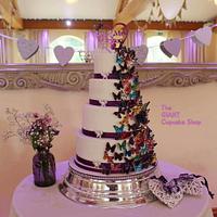 Multi coloured butterfly wedding cake