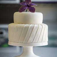 White cake purple flower