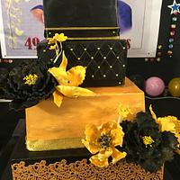 Gold and black theme cake 