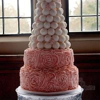 Ruffle cake with tower of cake balls