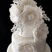 White peony and lace wedding cake