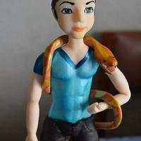 The man and the snake topper. ( Sugar Figurine.)
