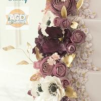 Purple bas relief wedding cake