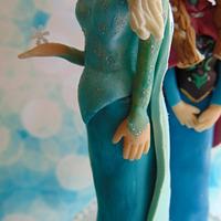 Frozen cake with modelling chocolate figures