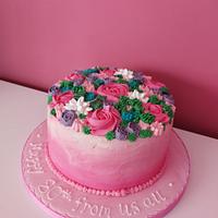 Bright piped flowers cake