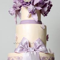 Baroque wedding cake with purple peonies