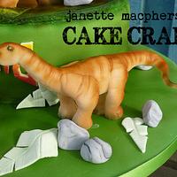 Volcano and dinosaurs birthday cake