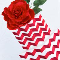 Red chevron cake with big rose