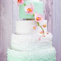 mint ruffles with orchids