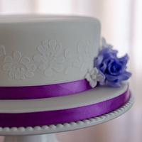 Purple themed wedding cake