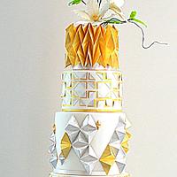 gold silver white cake with clematis