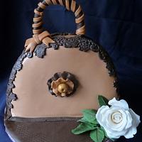 The hand bag with white rose
