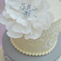 Wedding cake in cream and grey colour