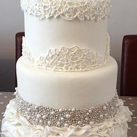 ruffles, edible bead encrusting, sugar peony and royal icing cage all on one cake!