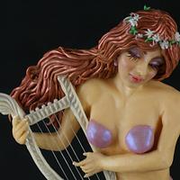 Angel playing harp