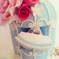 Diamond ring in a birdcage cake