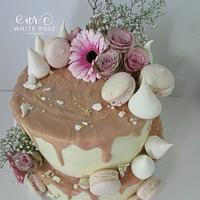 Blush Pink and Nude two tier drippy cake with fresh flowers