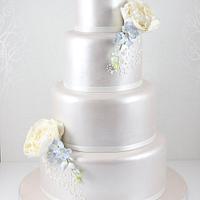 Lustred peony and freesia wedding cake