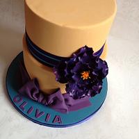 Orange and purple cake with open rose