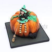 Cute witch on Pumpkin